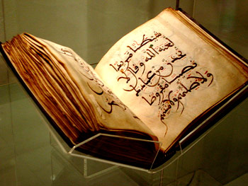 The Qur’an open on a stand
