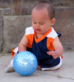 Baby playing with a ball