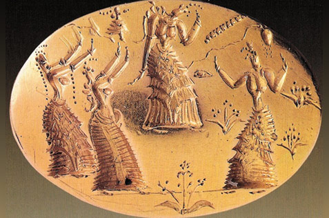 Gold signet ring with women dancing
