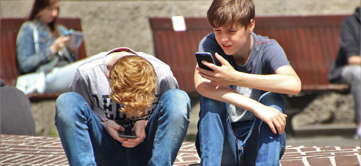 kids playing on cellphones