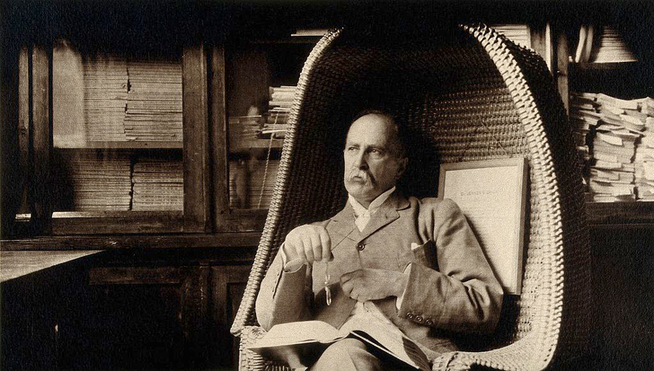 Sir William Osler in Edward Jenner's chair in the room of the Wellcome