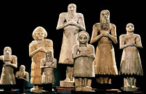 Worshipper statues